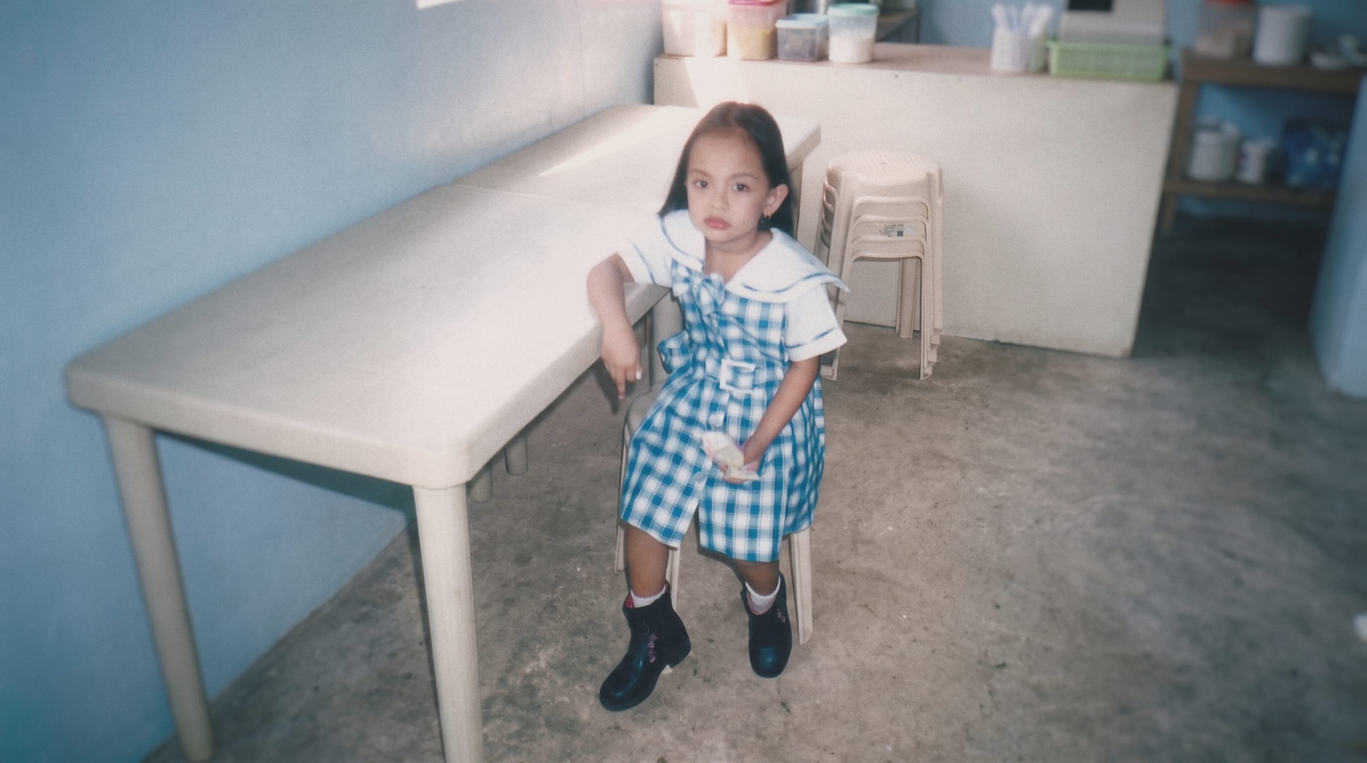 Me as a child, in school uniform